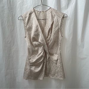 Silk like sleeveless wrap blouse